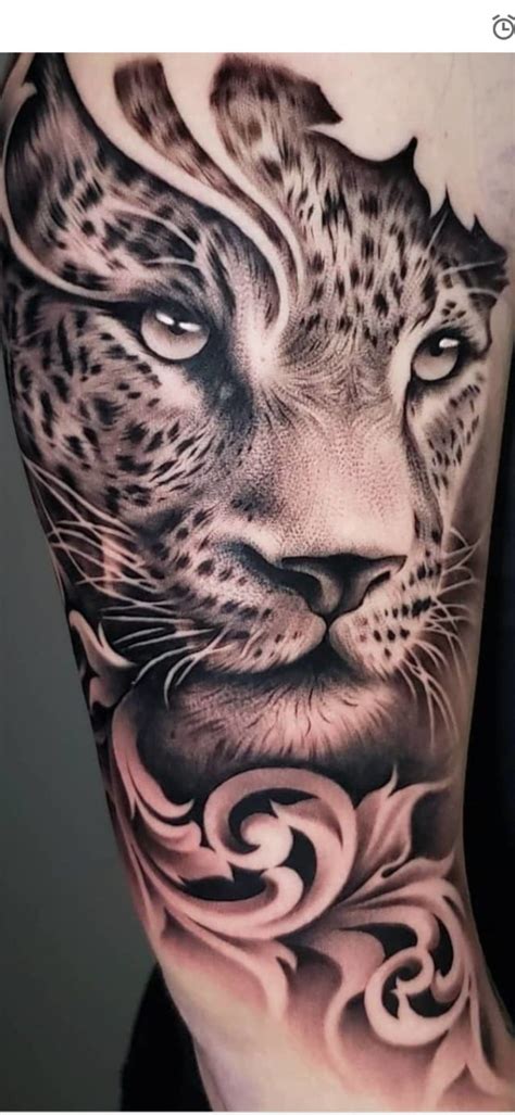 snow leopard tattoo